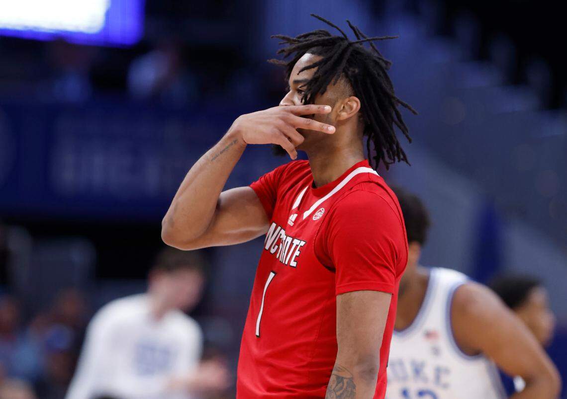 N.C. State’s Jayden Taylor (1) celebrates making a three-pointer during the first half of N.C. State’s game against Duke in the quarterfinal round of the 2024 ACC Men’s Basketball Tournament at Capital One Arena in Washington, D.C., Thursday, March 14, 2024.