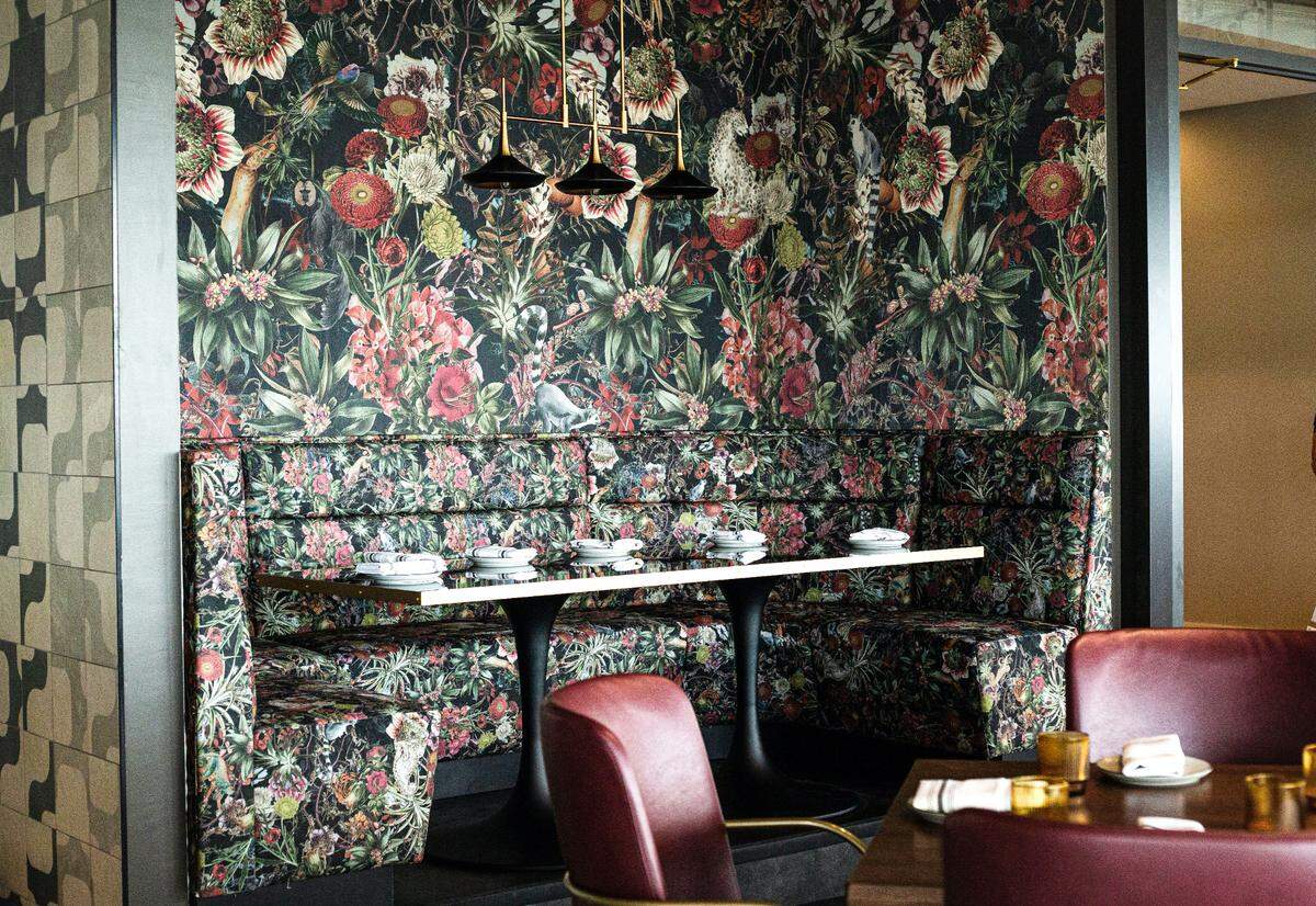 Look for bold florals in the sunlit dining room of The Lenny, downtown Durham’s newest and tallest restaurant.