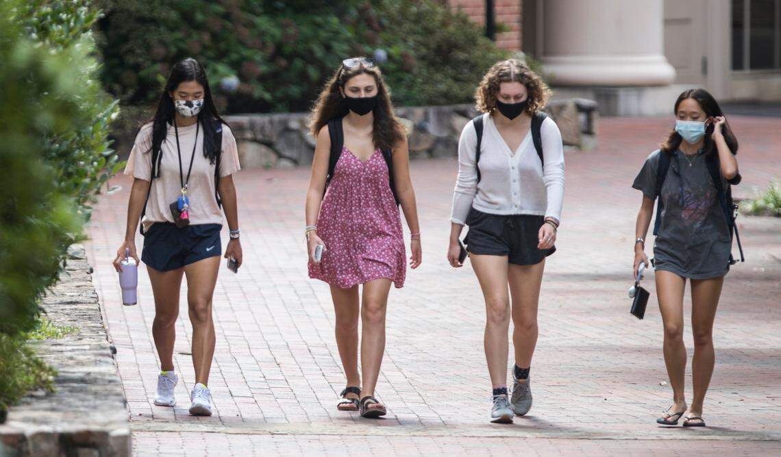 Students venture from south campus dormitories on UNC-Chapel Hill’s campus during the first week of classes on Wednesday, Aug. 12, 2020.