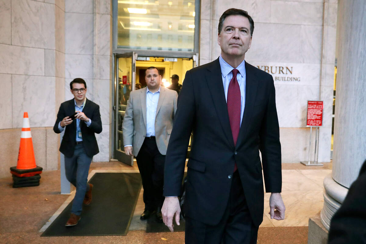 Former Federal Bureau of Investigation Director James Comey leaves the Rayburn House Office Building after testifying to the House Judiciary and Oversight and Government Reform committees on Capitol Hill December 07, 2018 in Washington, DC.