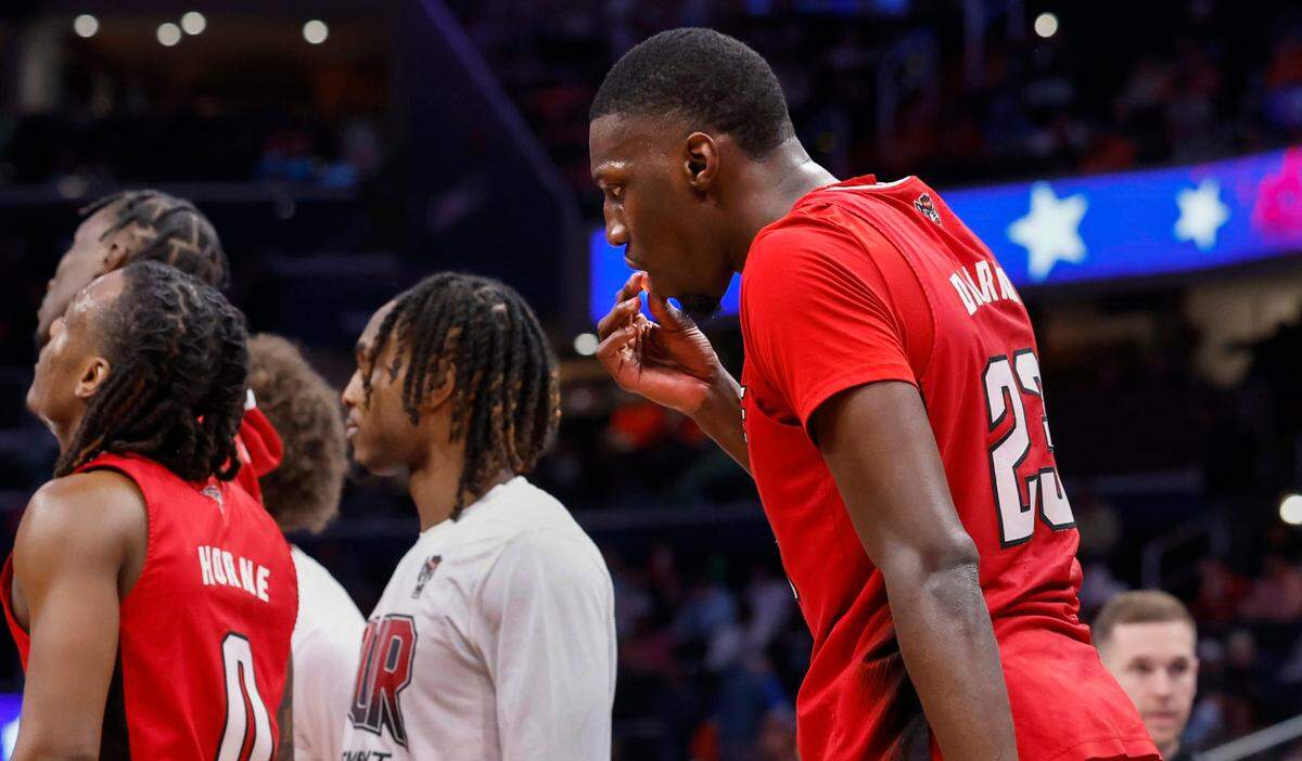 N.C. State’s Mohamed Diarra (23) eats during a timeout in the second half of N.C. State’s 83-65 victory over Syracuse in the second round of the 2024 ACC Men’s Basketball Tournament at Capital One Arena in Washington, D.C., Wednesday, March 13, 2024.