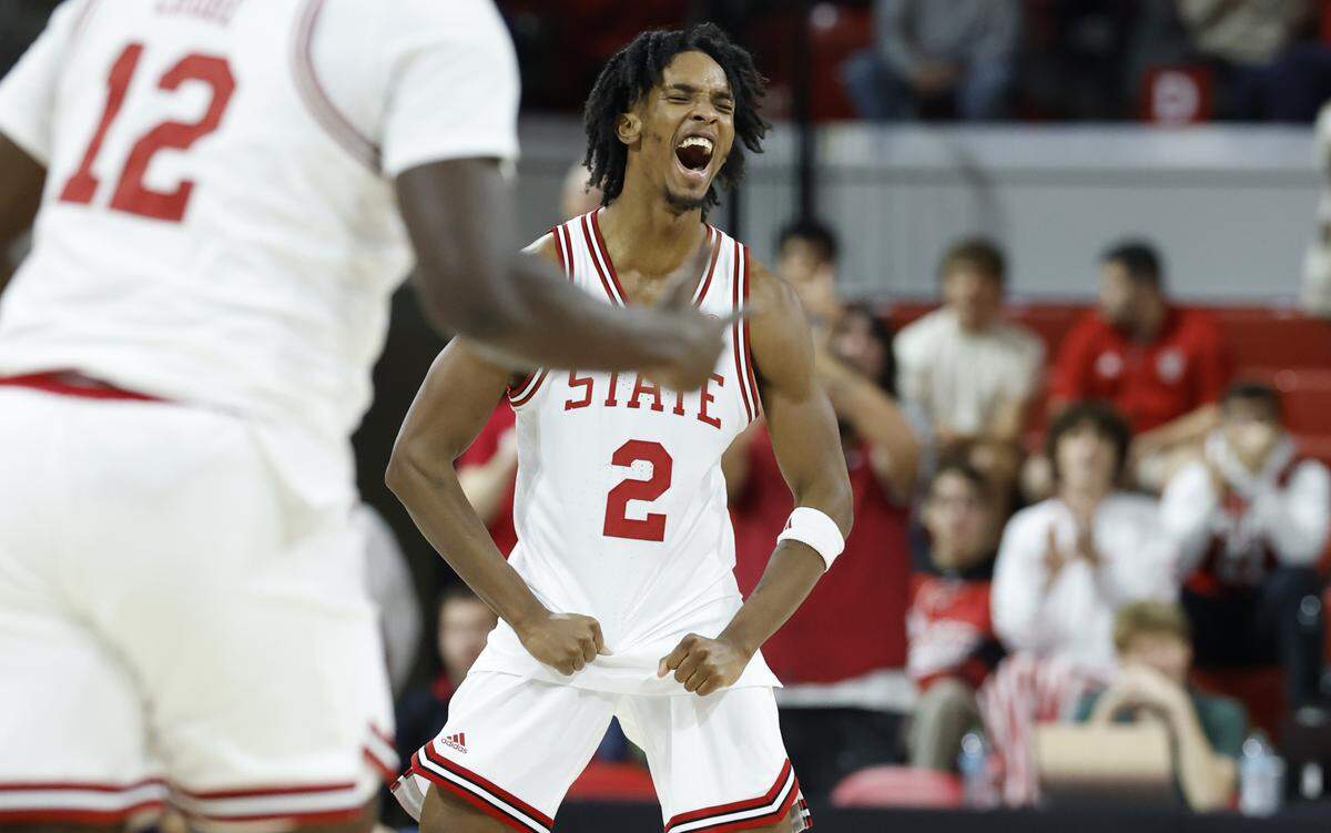 N.C. State's Paul McNeil Jr. (2) celebrates after making his 11th three-pointer in the second half of N.C. State’s 108-72 victory over Texas Southern at Reynolds Coliseum in Raleigh, N.C., Wednesday, Dec. 17, 2025.