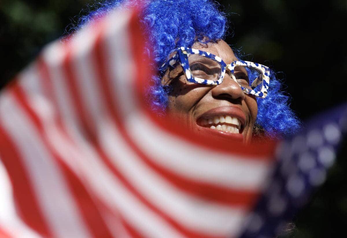 Dr. Cassandra S. Conover smiles during a rally organized by the North Carolina Democratic Party outside the State Capitol on Tuesday, Oct. 21, 2025, held to protest the congressional redistricting proposal. 