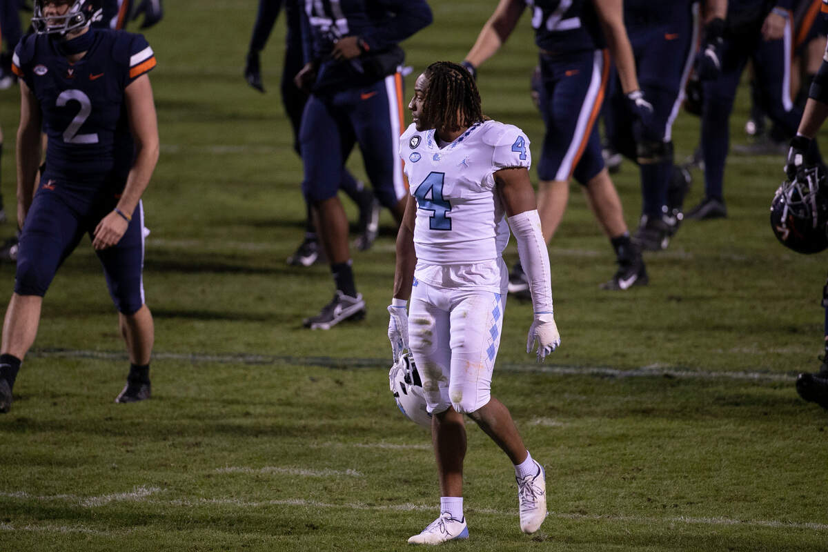 North Carolina’s Trey Morrison (4) leaves the field following the Tar Heels’ 44-41 loss to Virginia on Saturday, October 31, 2020 at Scott Stadium in Charlottesville, Va.