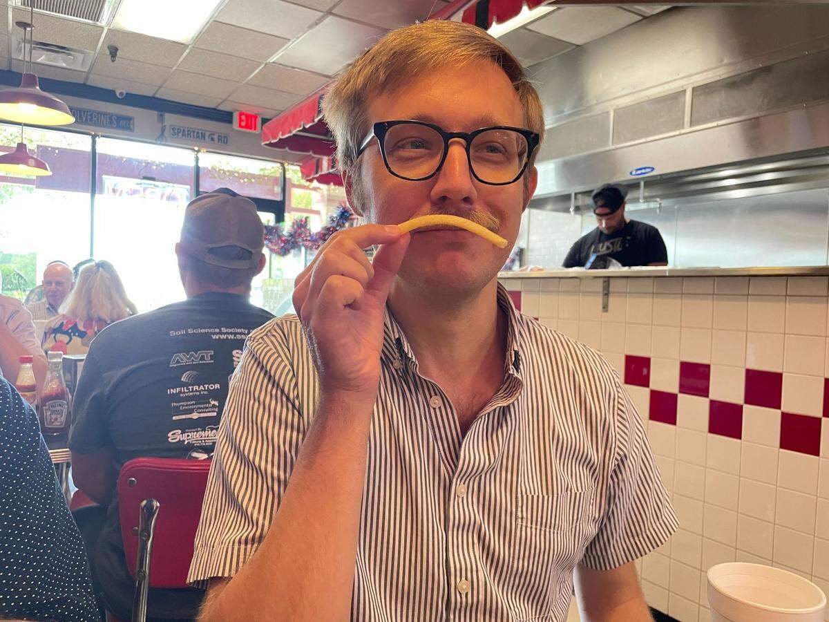 Strange things might happen when you have your first perfect french fry from Cloo’s Coney Island. Here is a portrait of News & Observer food writer Drew Jackson, who already has a mustache, with a french fry mustache. The hot dog and hamburger place has been in the Mission Valley Shopping Center near NC State’s campus in Raleigh for more than 30 years.