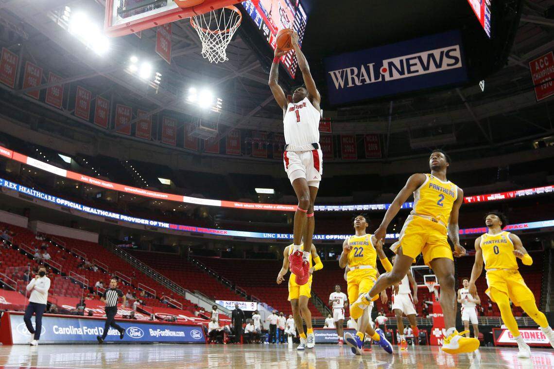 N.C. State’s Dereon Seabron (1) heads to slam in two during N.C. State’s 65-62 victory over Pittsburgh at PNC Arena in Raleigh, N.C., Sunday, February 28, 2021.