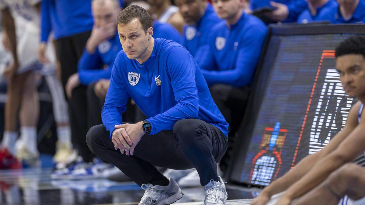 Duke coach Jon Scheyer watches as Connecticut cuts the Blue Devils’ lead to four points with two minutes to play on Sunday, March 29, 2026, in the NCAA East Regional Final, at Capital One Arena in Washington, D.C. The Blue Devils held a 19 point lead in the first half.