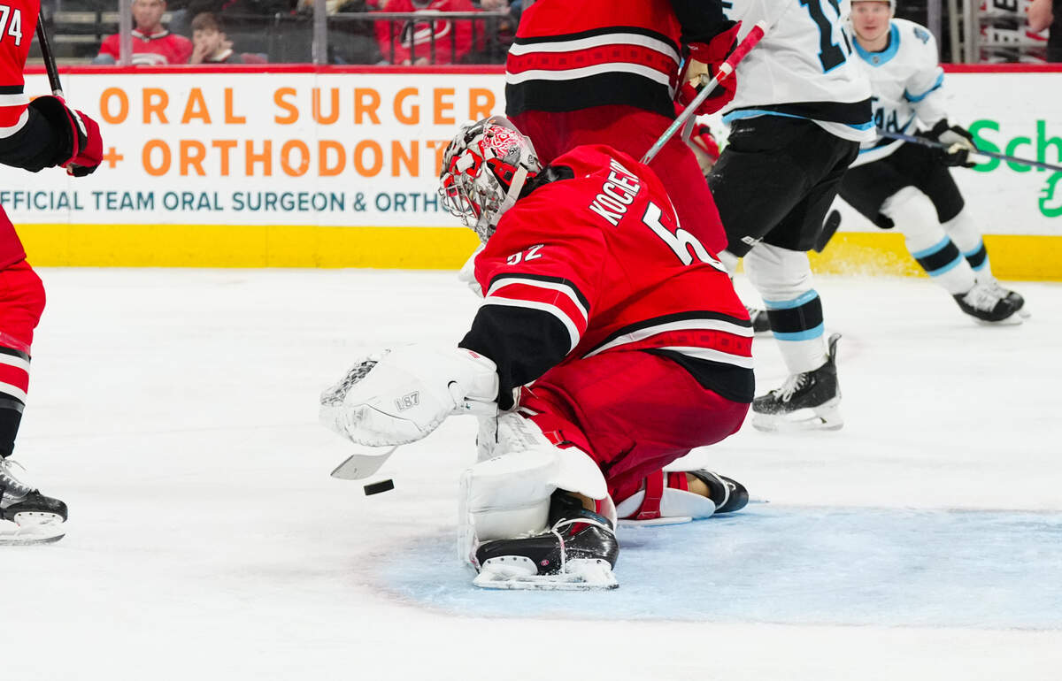 Carolina Hurricanes goaltender Pyotr Kochetkov (52) stops the shot against the Utah Hockey Club during the second period at Lenovo Center.