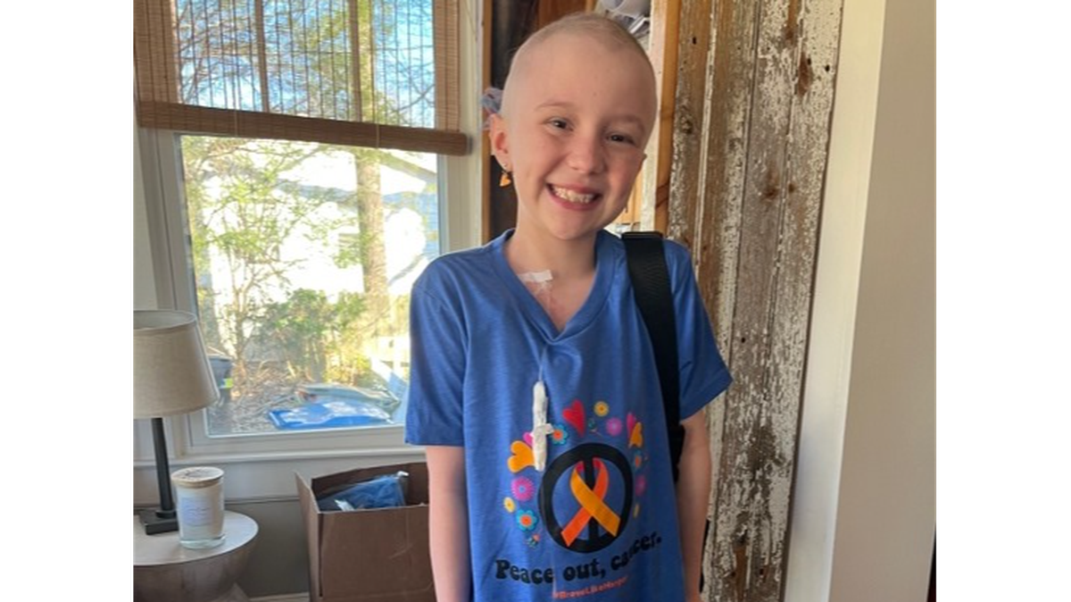 Harper Harrell, 9, has been fighting leukemia since October and is now cancer free on her scans. She designed this T-shirt to raise money for cancer research.