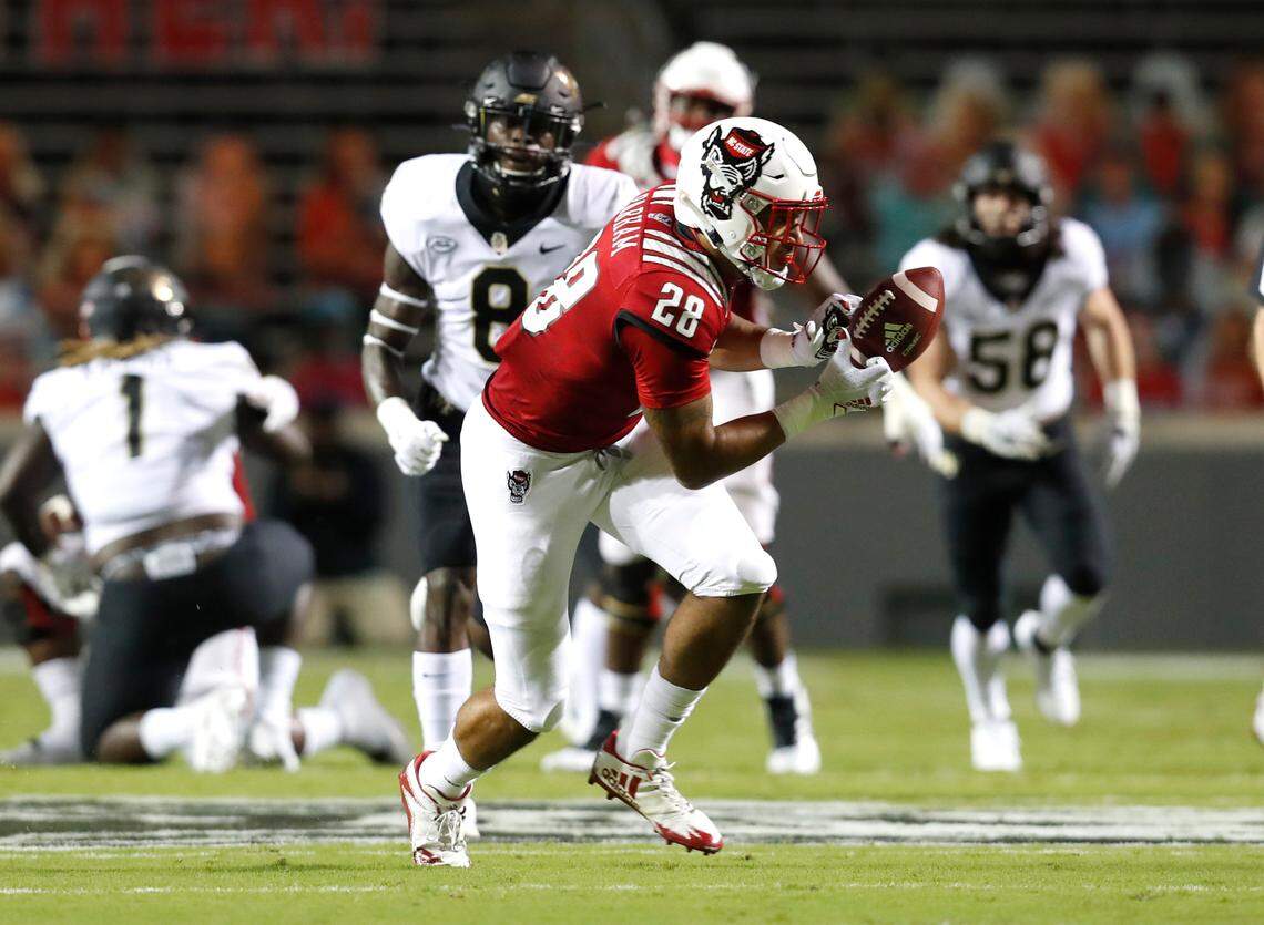 N.C. State tight end Dylan Parham (28) pulls in a reception during the first half of N.C. State’s game against Wake Forest at Carter-Finley Stadium in Raleigh, N.C, Saturday, Sept. 19, 2020.