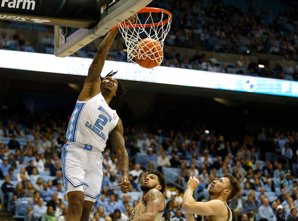 North Carolina’s Caleb Love dunks during the second half of the Tar Heels’ game against Georgia Tech at the Dean E. Smith Center on Saturday, Dec. 10, 2022, in Chapel Hill, N.C.