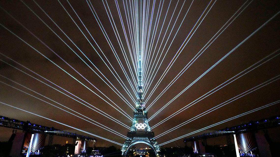 A laser show with the Eiffel Tower as seen from the Trocadero during the Opening Ceremony for the Paris 2024 Olympic Summer Games along the Seine River on July 26, 2024.