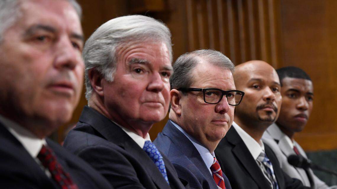 In this Feb. 11, 2020, file photo, a panel of witnesses, from left, Big 12 Conference Commissioner Bob Bowlsby, NCAA President Mark Emmert, University of Kansas Chancellor Dr. Douglas Girod, National College Players Association Executive Director Ramogi Huma and NCAA Student-Athlete Advisory Committee Chair Kendall Spencer, listen during a Senate Commerce subcommittee hearing on intercollegiate athlete compensation on Capitol Hill in Washington.