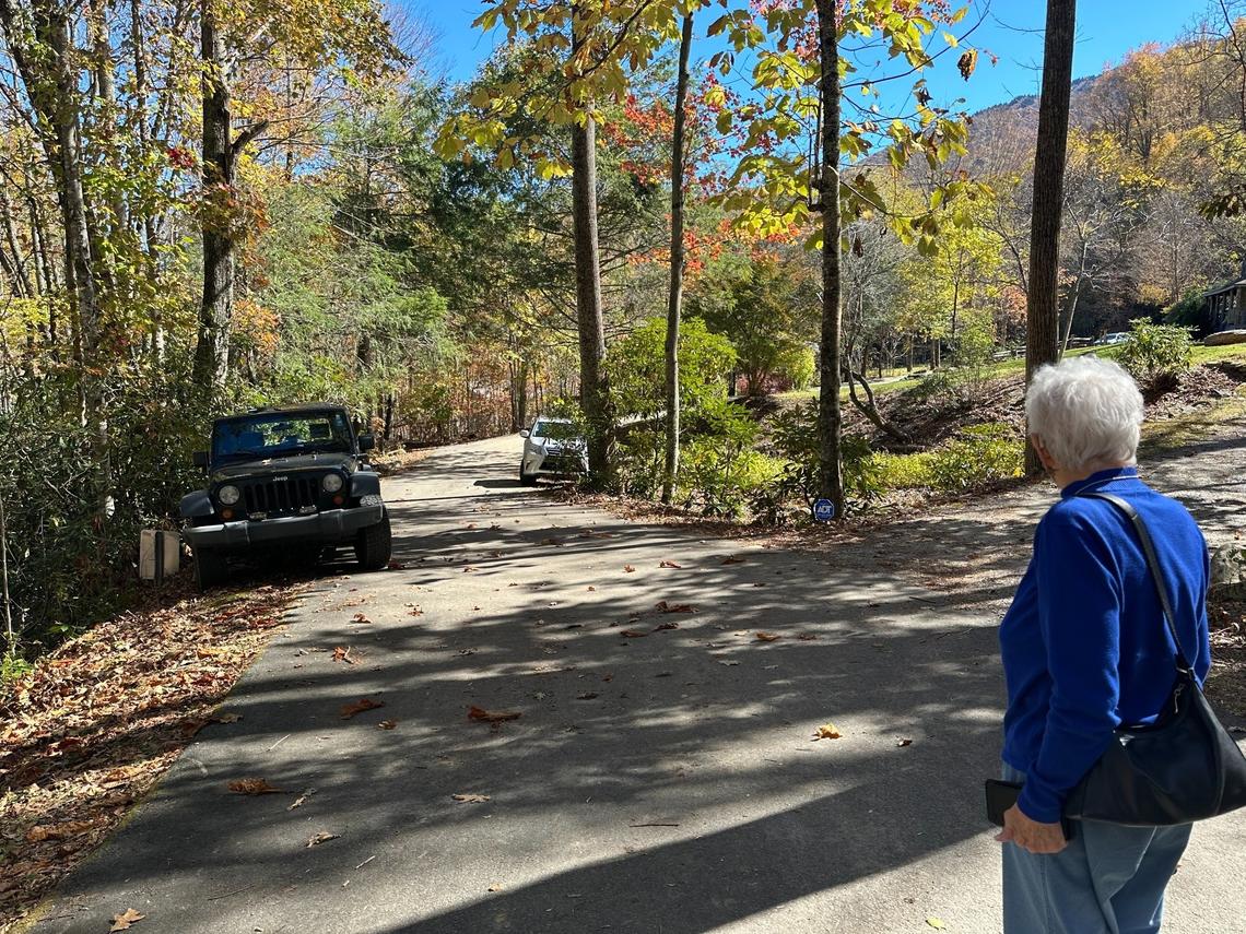 Rep. Virginia Foxx stares at the vehicles belonging to the Davis family parked on her property