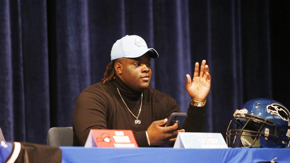 Clyde Pinder Jr. commits to playing football at the University of North Carolina at Chapel Hill during the signing day ceremony at Armwood High School in Seffner, Florida on February 5, 2020. On Thursday, Pinder announced he was headed to the transfer portal, ending his playing time at UNC.