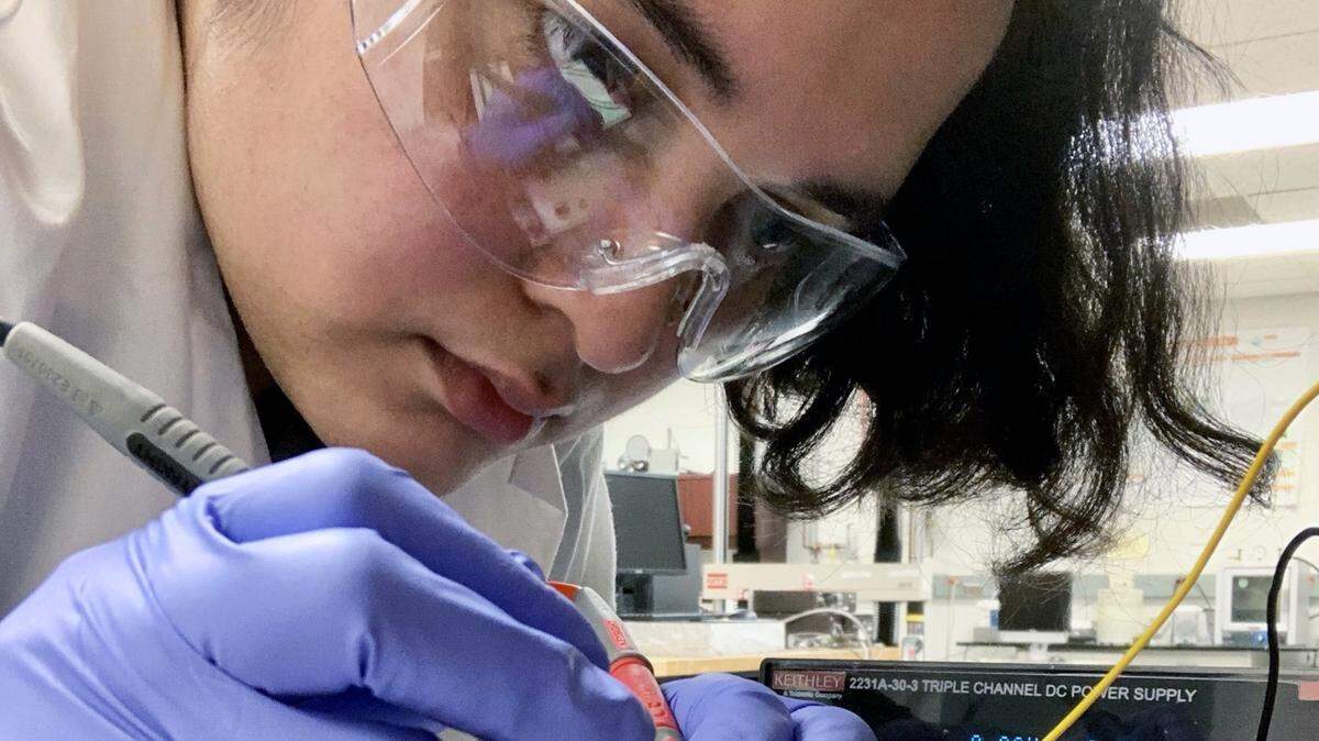 Kony Chatterjee, a doctoral candidate at N.C. State, works in the SmARTextiles Laboratory on campus.