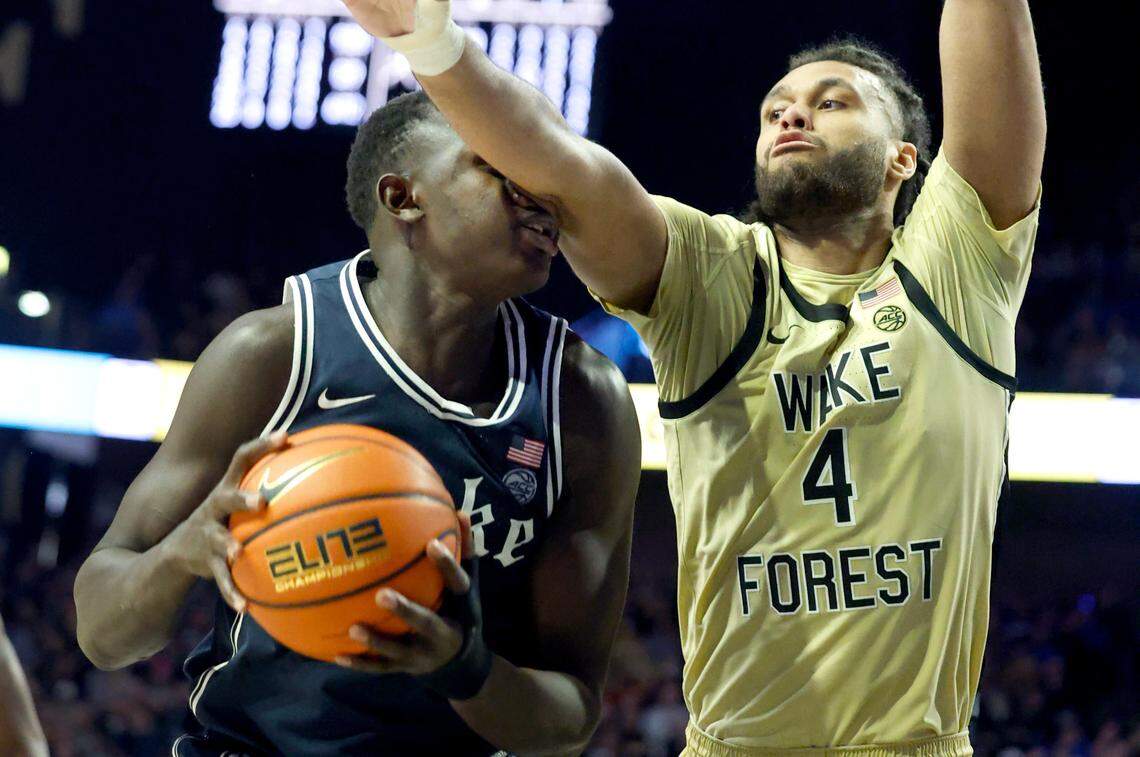 Wake Forest’s Efton Reid III (4) fouls Duke’s Khaman Maluach (9) during the second half of Duke’s 63-56 victory over Wake Forest at LJVM Coliseum in Winston-Salem, N.C., Saturday, Jan. 25, 2025.