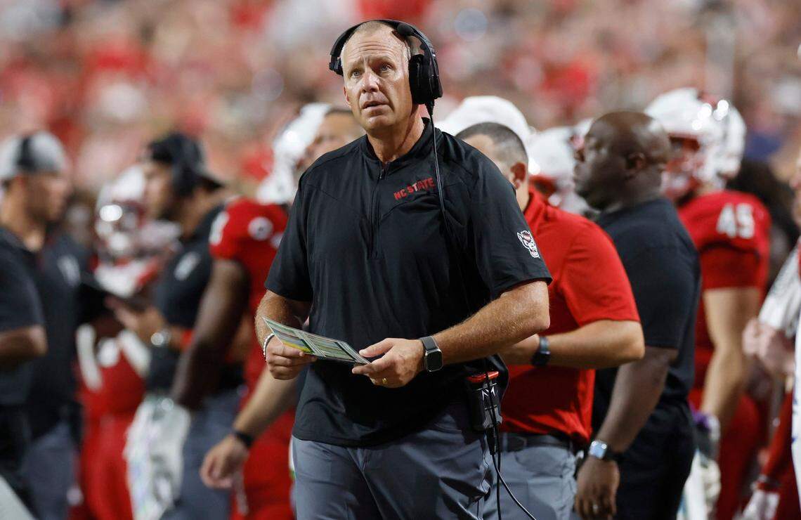 N.C. State head coach Dave Doeren looks up at the scoreboard during the first half of N.C. State’s game against Western Carolina at Carter-Finley Stadium in Raleigh, N.C., Thursday, August 29, 2024.