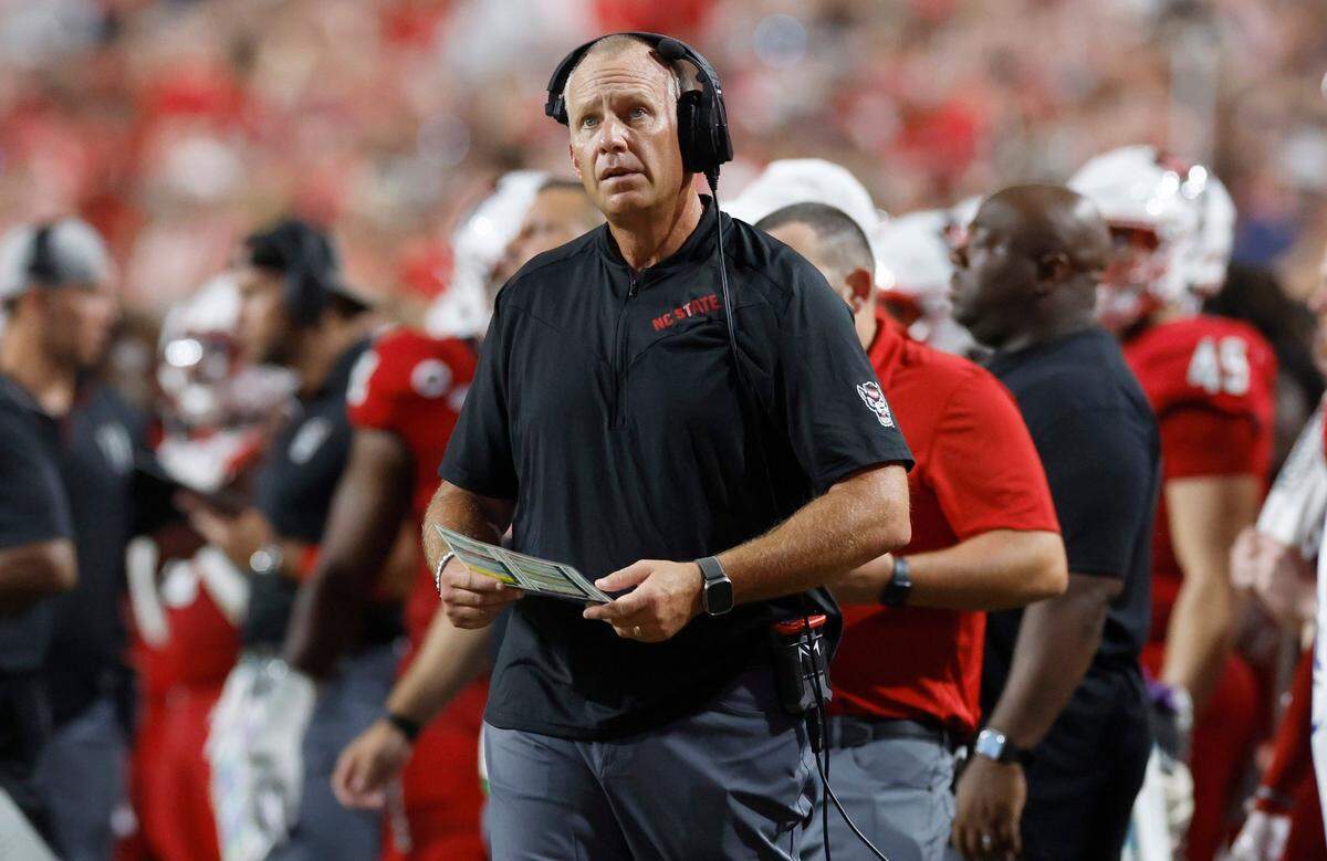 N.C. State head coach Dave Doeren looks up at the scoreboard during the first half of N.C. State’s game against Western Carolina at Carter-Finley Stadium in Raleigh, N.C., Thursday, August 29, 2024.