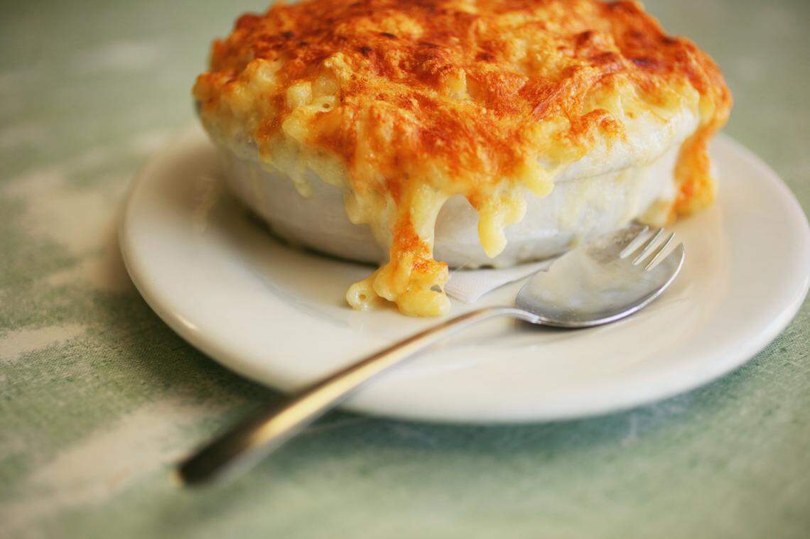 A crispy cheese top forms on the legendary macaroni au gratin at Poole’s Diner in Raleigh.