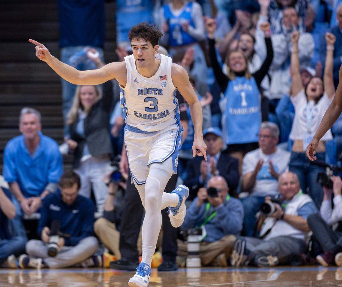 North Carolina’s Cormac Ryan (3) reacts after sinking a three-point in the first half against Duke on Saturday, February, 3, 2024 at the Dean E. Smith Center in Chapel Hill, N.C.