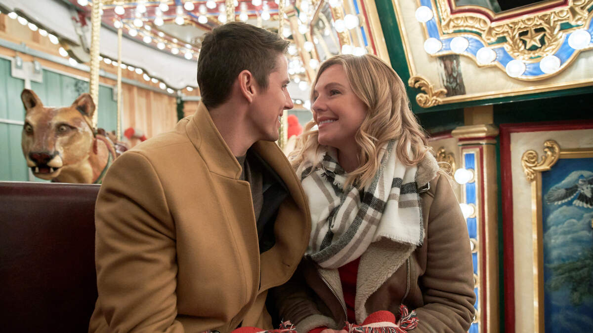 Eloise Mumford, right, and Sean Faris in “A Veteran’s Christmas” on Hallmark Movies & Mysteries.
