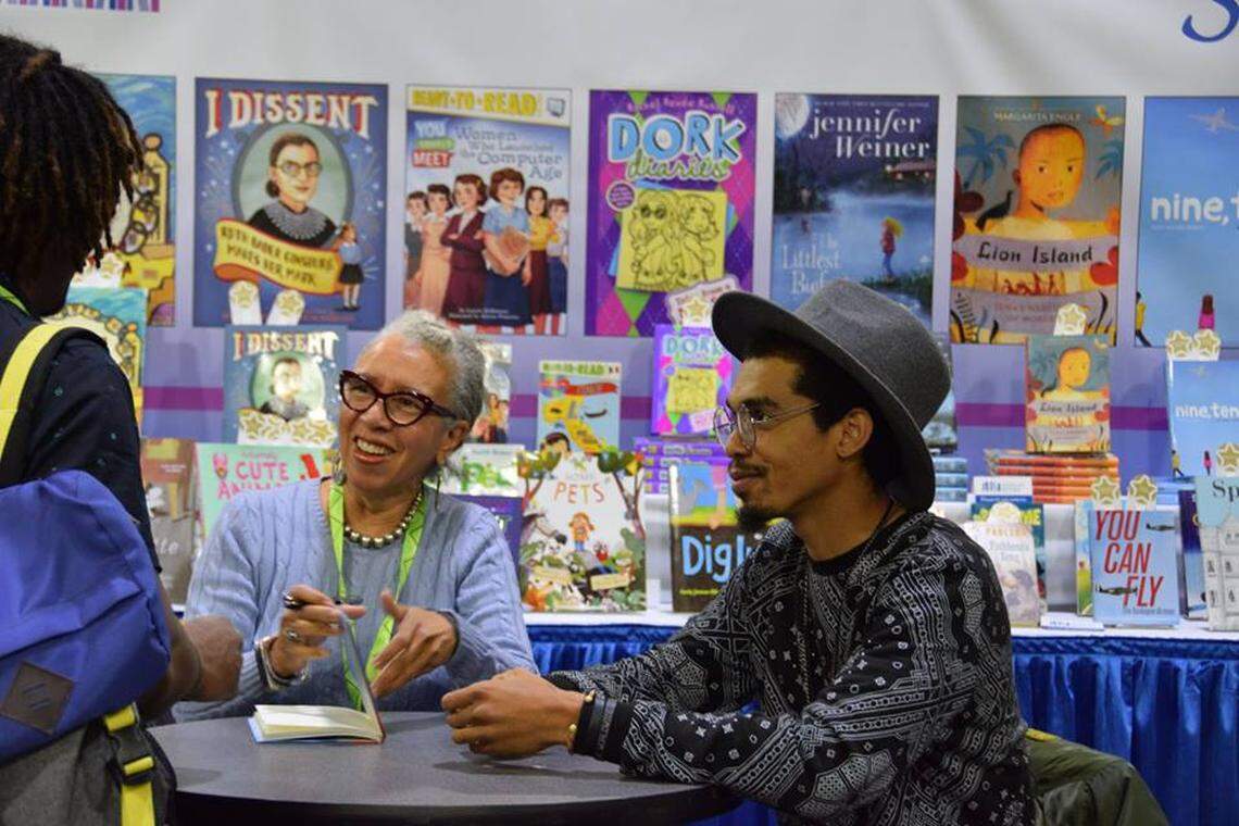 Carole Boston Weatherford and her son, Jeffery Boston Weatherford, at a conference in 2016. She has written some of her books in collaboration with him.