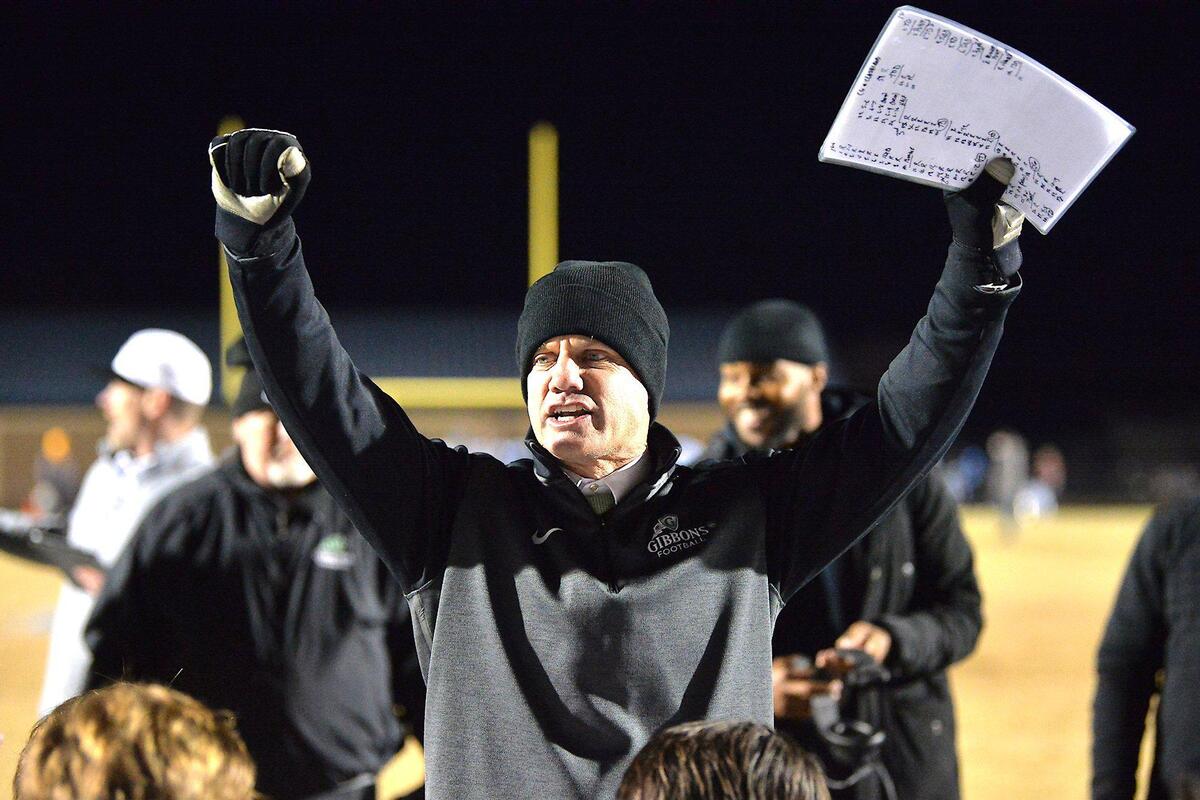 Cardinal Gibbons’ football head coach Steven Wright addresses his team after their victory over Cleveland. The Cardinal Gibbons Crusaders and the Cleveland Rams met in the third round of the NCHSAA 4A football playoffs on November 19, 2021