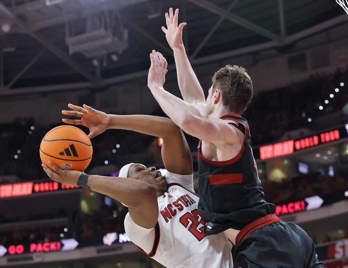 N.C. State's Ven-Allen Lubin shoots over Stanford's AJ Rohosy during the first half of the Wolfpack’s game on Saturday, March 7, 2026, at Lenovo Center in Raleigh, N.C.