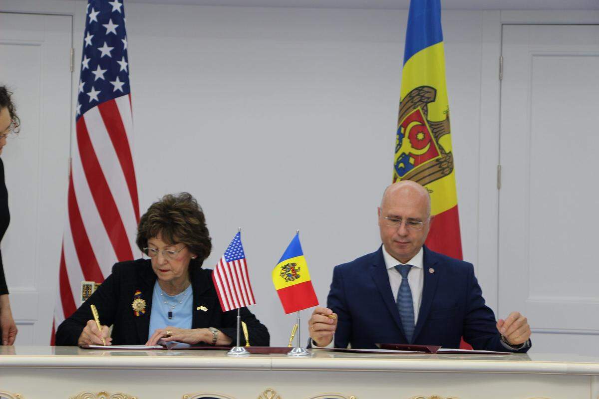 N.C. Secretary of State Elaine Marshall and Moldovan Prime Minister Pavel Filip sign the fifth five-year agreement between the state and the Eastern European country in Moldova’s capital Chisinau in 2019.