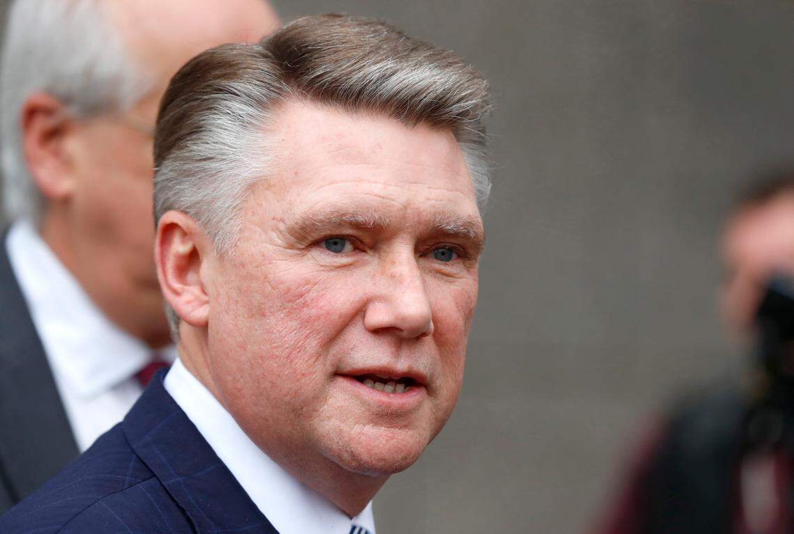 Republican Mark Harris and his attorney David Freedman speak with the media after meeting with state election investigators at the Dobbs Building in Raleigh, N.C., Thursday, Jan. 3, 2019.
