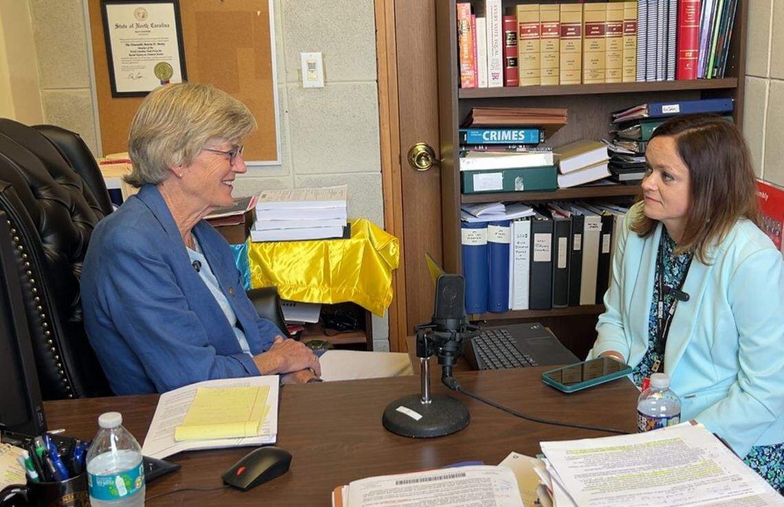 N.C. Rep. Marcia Morey, left, is interviewed by News & Observer Capitol Bureau Chief Dawn Vaughan, right, during a recording of the Under the Dome politics podcast recorded in Morey’s Legislative Building office on Thursday, July 13. 2023.