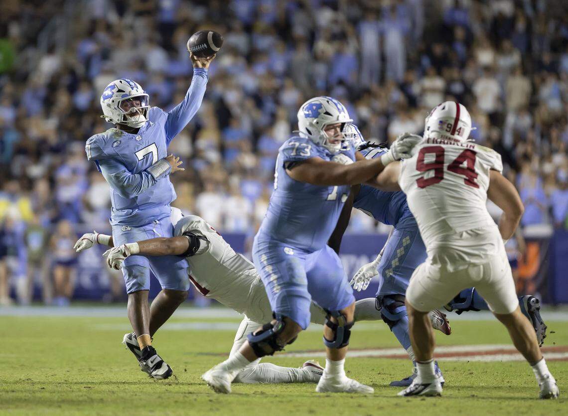 North Carolina quarterback Gio Lopez (7) passes to running back Davion Gause for a 20 yard touchdown completion in the third quarter to take a 10-3 lead over Stanford on Saturday, November 8, 2025 at Kenan Stadium in Chapel Hill, N.C.