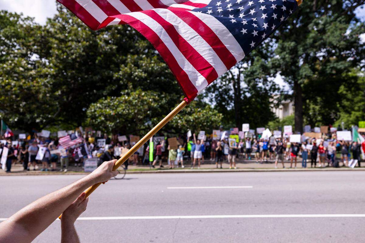 Hundreds of demonstrators rally at the North Carolina State Capitol on Saturday, June 14, 2025. The event was one of dozens held across the state and hundreds nationwide during what organizers called a nationwide day of defiance against the Trump administration.