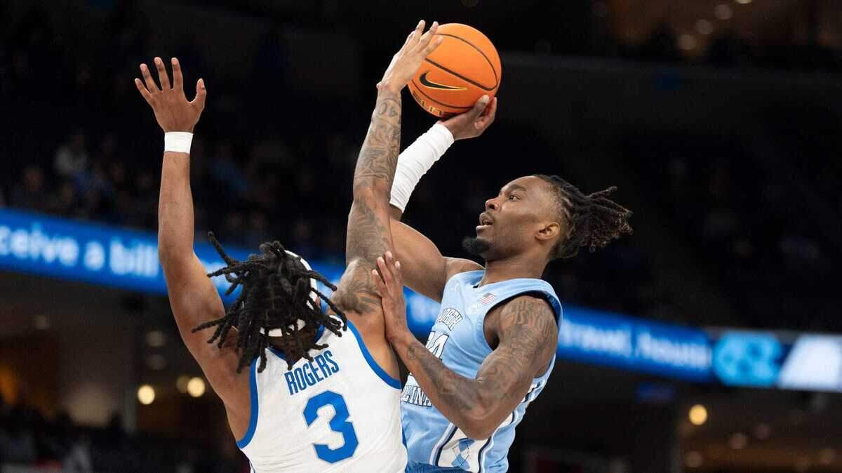 Memphis’ Colby Rogers (3) tries to block North Carolina’s Jae’Lyn Withers (24) during the game between UNC and Memphis in the Hoops for St. Jude Tip Off Classic at FedExForum on Tuesday, October 15, 2024.