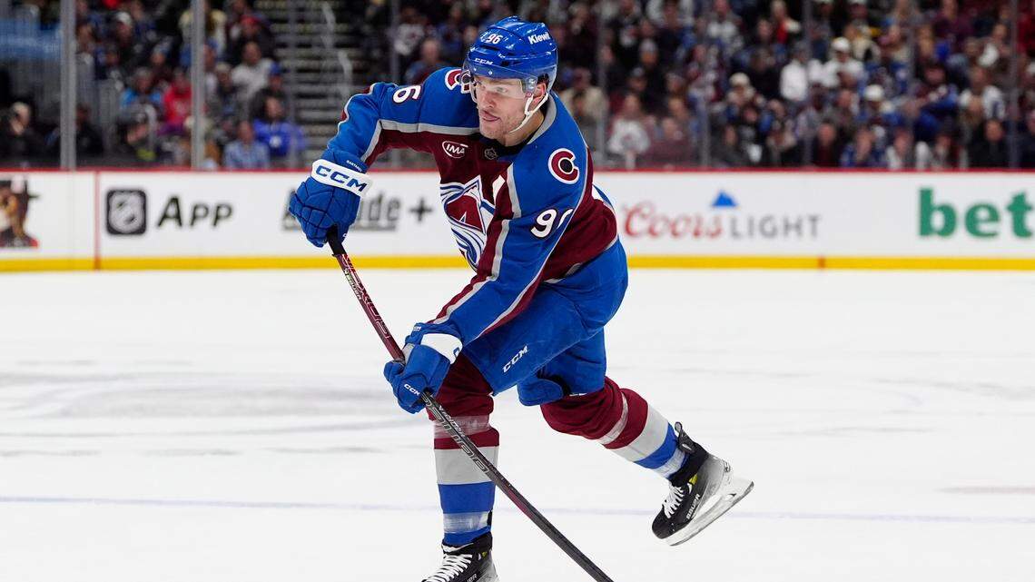 Colorado Avalanche right wing Mikko Rantanen (96) shoots the puck in the second period against the New York Rangers at Ball Arena.