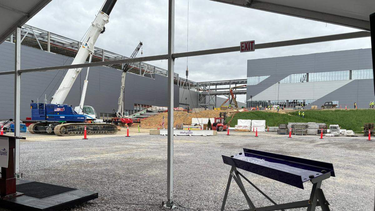 The Durham semiconductor chipmaker Wolfspeed celebrated the “topping out” of its Chatham County facility near Siler City on March 26, 2024. Construction on the site began in June.