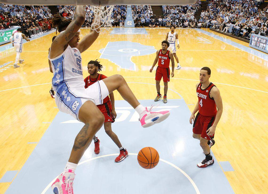 North Carolina’s Armando Bacot (5) slams in two during UNC’s 100-80 victory over N.C. State at the Smith Center in Chapel Hill, N.C., Saturday, Jan. 29, 2022.