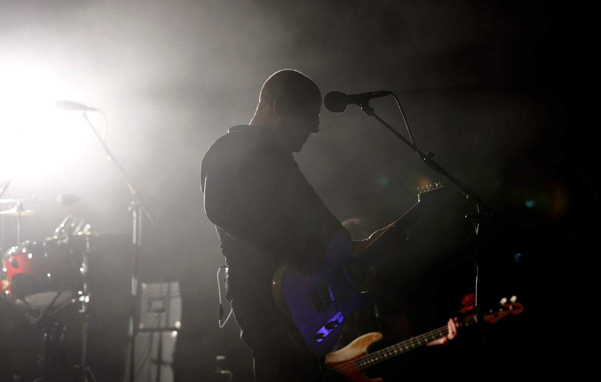 Black Francis performs as the Pixies play at Red Hat Amphitheater in Raleigh, N.C., during their North American tour on Friday, June 16, 2023.