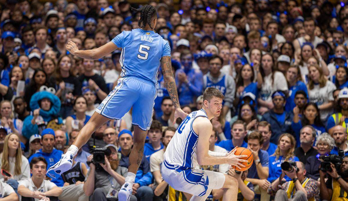 Duke’s Kyle Filipowski (30) puts a fake on North Carolina’s Armando Bacot (5) during the first half on Saturday, March 9, 2024 at Cameron Indoor Stadium in Durham, N.C.