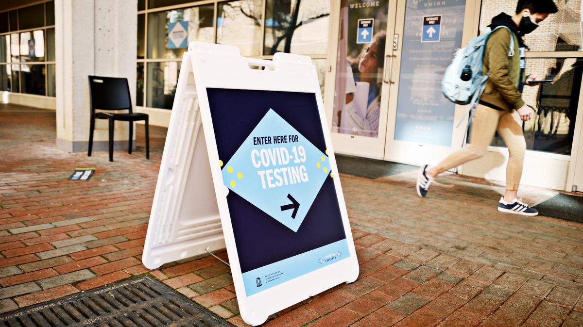 A sign advertising COVID-19 testing at UNC-Chapel Hill’s Carolina Union is seen Monday, Feb. 8, 2021, shortly after the university began delayed in-person classes that semester.