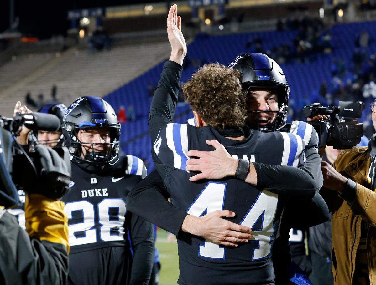 Duke’s Todd Pelino is congratulated by teammate Charlie Ham after Pelino made a field goal to give the Blue Devils a 24-21 win over Wake Forest on Thursday, Nov. 2, 2023, at Wallace Wade Stadium in Durham, N.C.