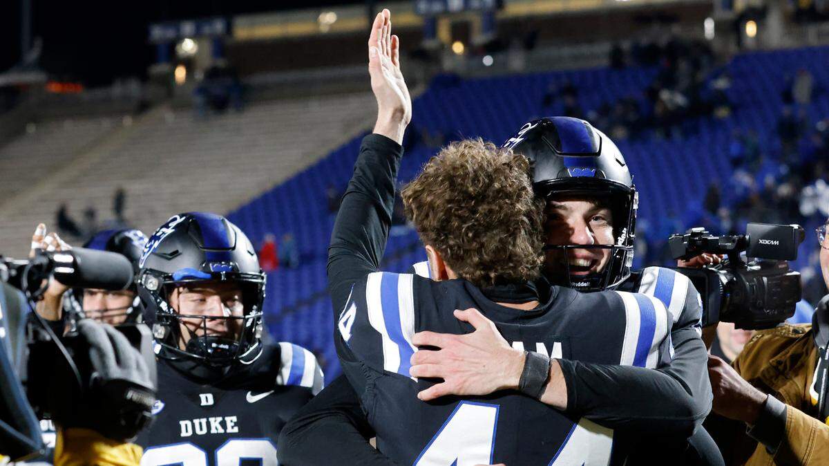 Duke’s Todd Pelino is congratulated by teammate Charlie Ham after Pelino made a field goal to give the Blue Devils a 24-21 win over Wake Forest on Thursday, Nov. 2, 2023, at Wallace Wade Stadium in Durham, N.C.