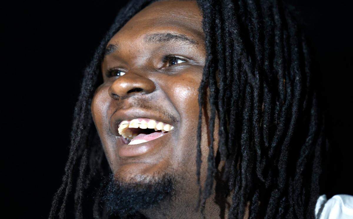 N.C. State’s DJ Burns Jr. laughs as he answers a question during a press availability at the American Airlines Center in Dallas, Texas, Saturday, March 30, 2024. Duke and N.C. State will play Sunday for a trip to the NCAA Tournament Final Four.