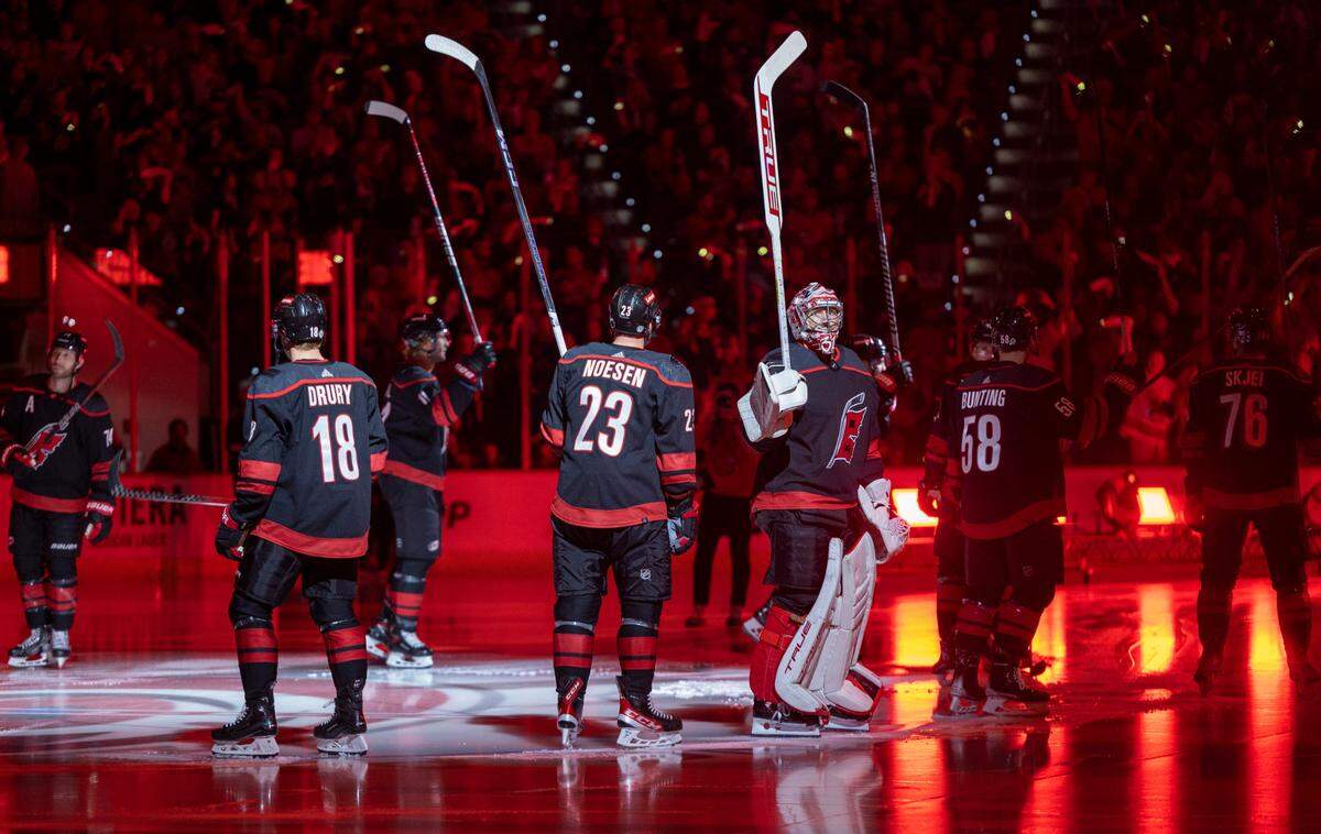 The Carolina Hurricanes goalie Frederik Andersen (31) and his teammates acknowledge the crowd following their introduction on Wednesday, October 11, 2023 at PNC Arena, in Raleigh N.C.