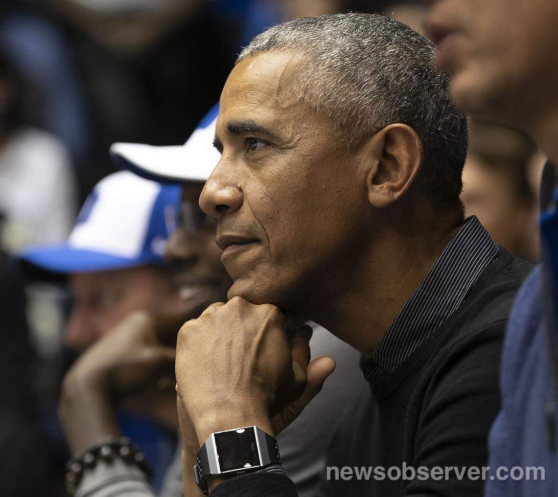 Former President Barack Obama watches the North Carolina vs Duke game on Wednesday, February 20, 2019 at Cameron Indoor Stadium in Durham, N.C.