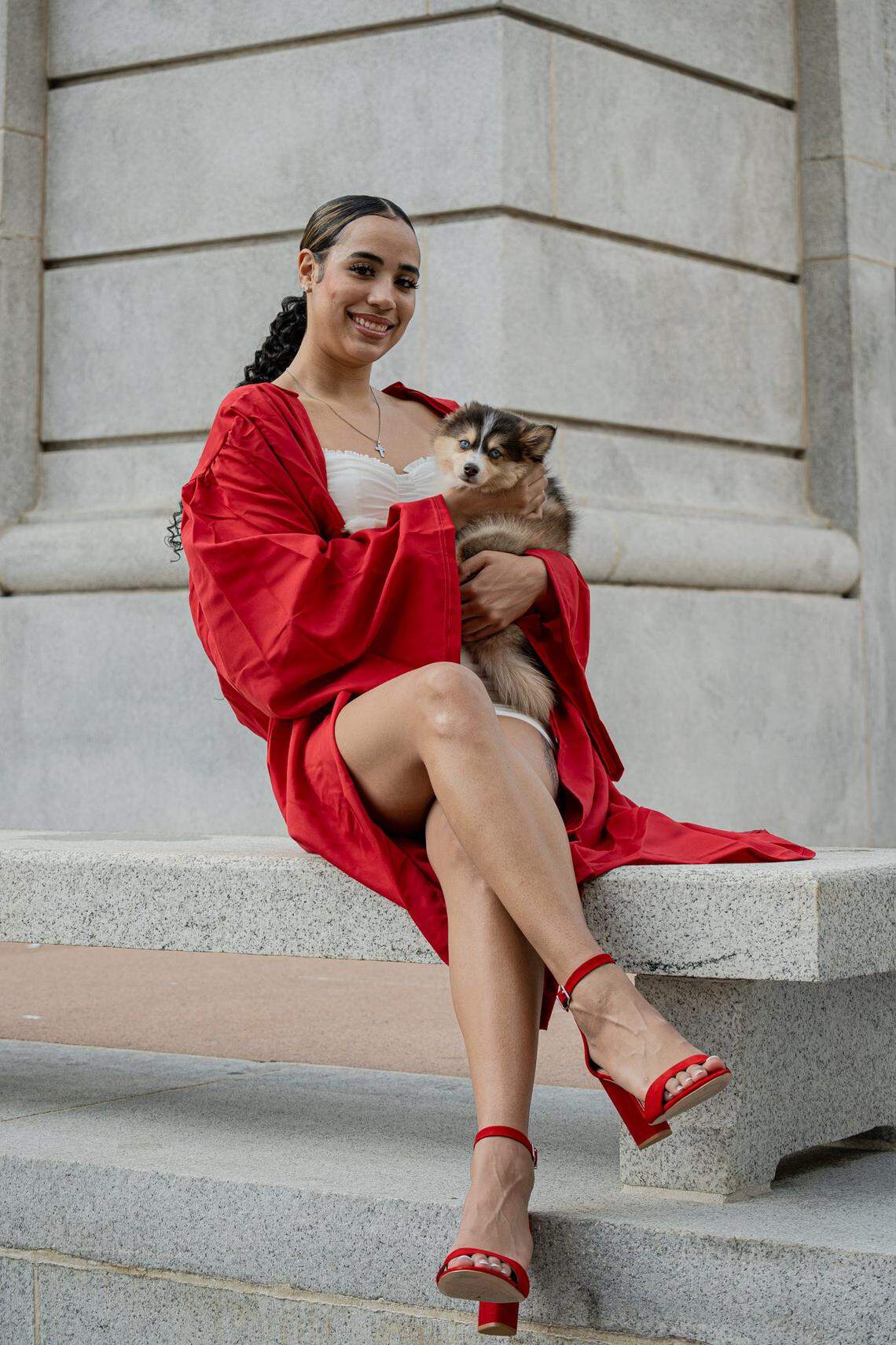 N.C. State guard Madison Hayes poses at the Bell Tower with her dog, Koda, on April 20, 2024. Five N.C. State women’s basketball players own a pet that lives with them in Raleigh.