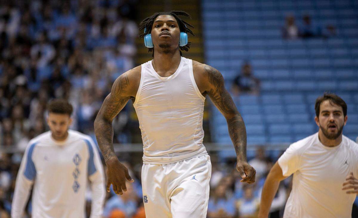 North Carolina’s Caleb Love (2) warms up with his teammates for the Tar Heels’ game against College of Charleston on Friday, November 11, 2022 at the Smith Center in Chapel Hill, N.C.