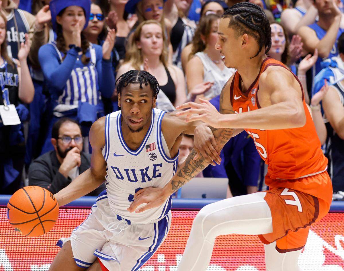 Duke’s Jeremy Roach drives by Virginia Tech’s Lynn Kidd during the second half of the Blue Devils’ 81-65 win over Virginia Tech on Saturday, Feb. 25, 2023, at Cameron Indoor Stadium in Durham, N.C.