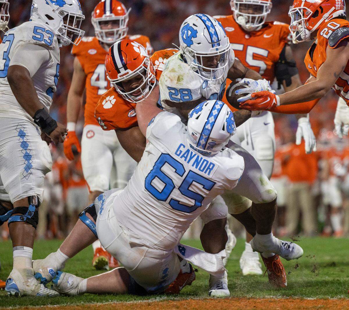 North Carolina’s Omarion Hampton (28) scores a touchdown on a three-yard run in the fourth quarter against Clemson on Saturday, November 18, 2023 at Memorial Stadium in Clemson, S.C.